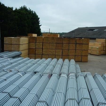 Galvanised scaffold tubes in bundles of 61 in a stockyard for sale at Gilray Plants
